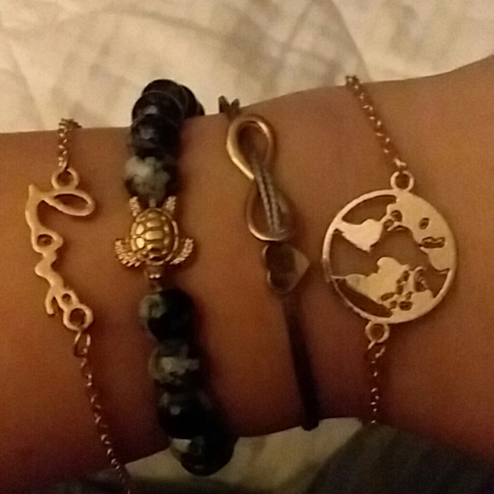 NWT world peace gold tone bead bracelet stack